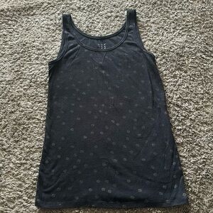 Kids large black tank top faded gold circles on it